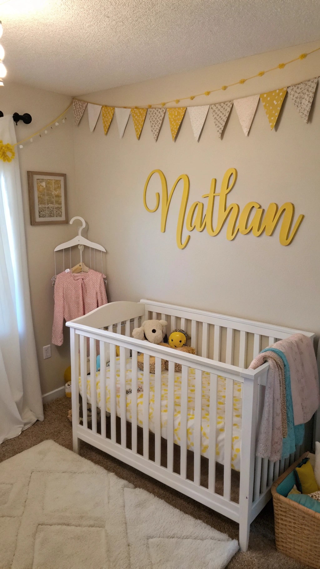 Personalized name display in a nursery with the name Nathan in mustard yellow.