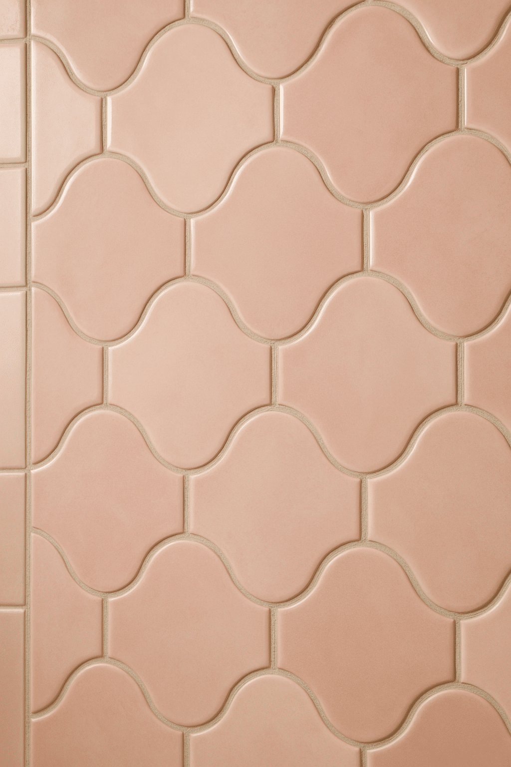Blush pink tile design with curved and straight patterns