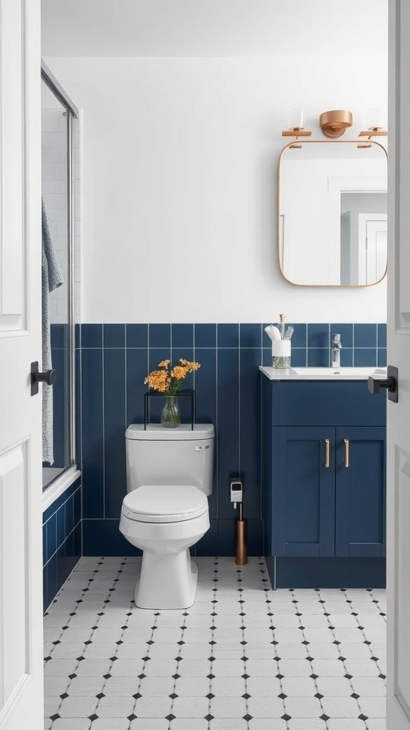 A mid-century bathroom featuring indigo tiles and cabinetry, with a modern mirror and gold accents.