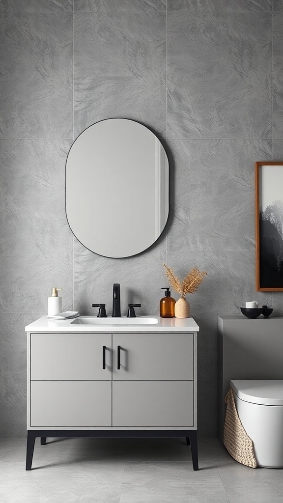 Stylish bathroom featuring textured gray walls, round mirror, and modern fixtures.